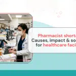 Pharmacist reviewing prescriptions in a busy healthcare facility facing staffing shortages